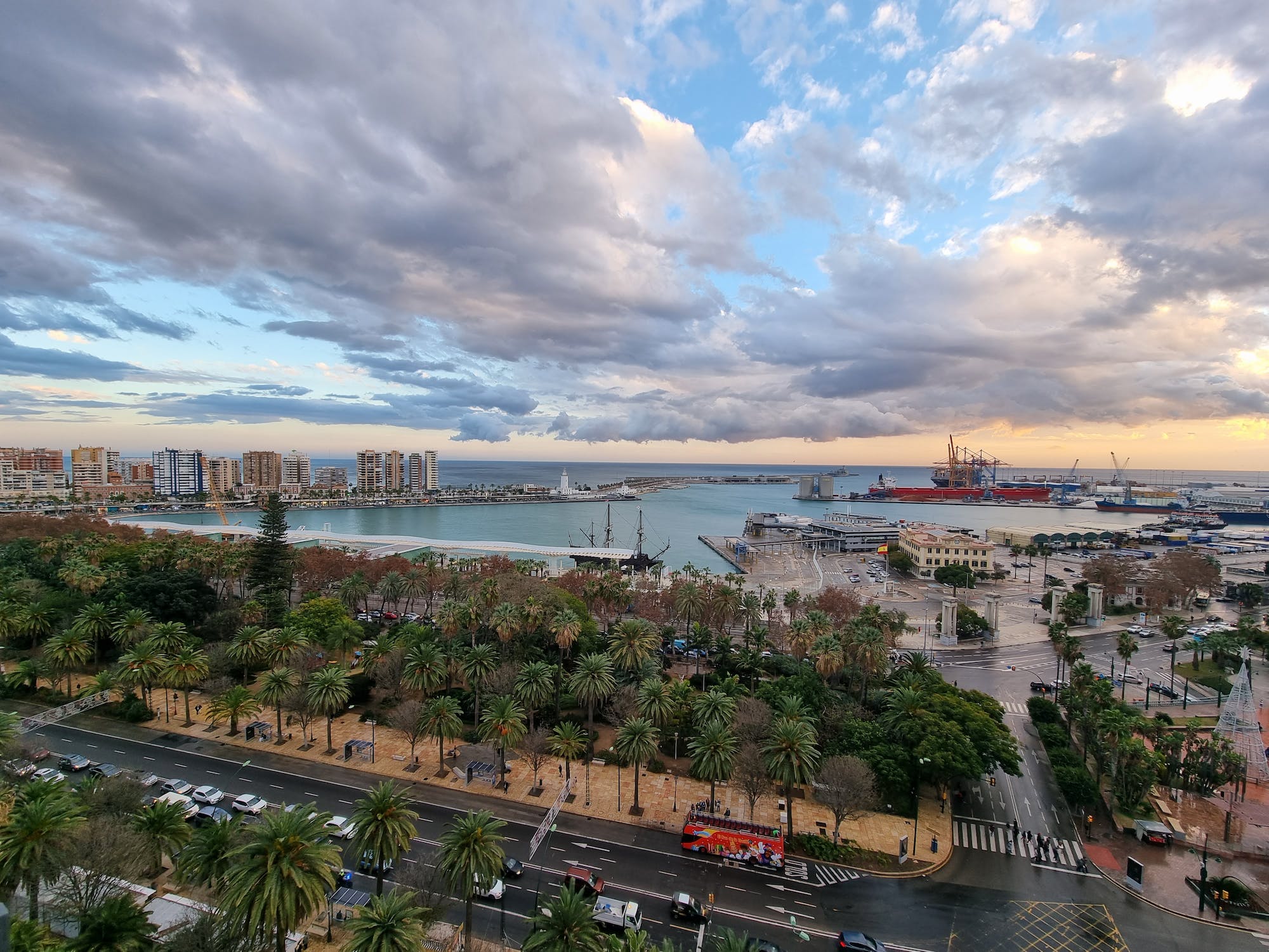 A view overlooking the Port in Malaga, there are clouds in the sky but it is a sunny day.